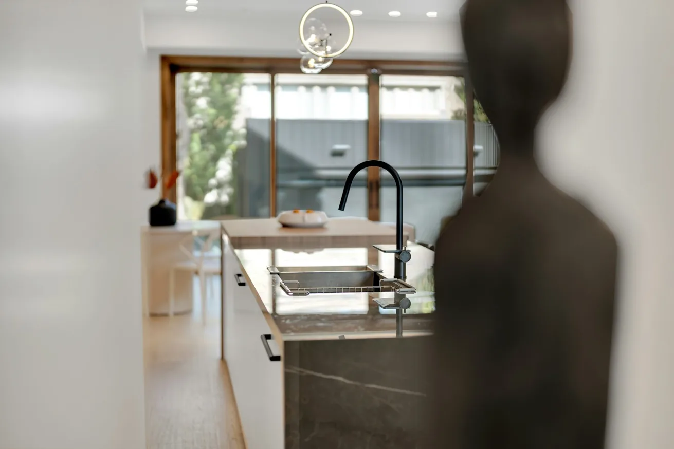 Luxury kitchen with integrated sink, faucet, cabinetry and appliance-ready layout